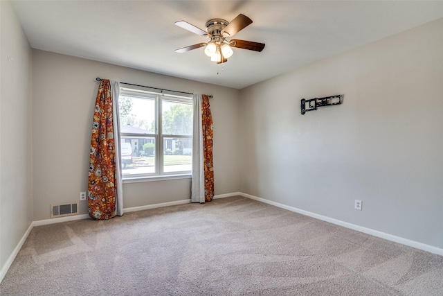 1601 Lexington Dr, Garland, TX 75041 - empty room with a ceiling fan, carpet flooring, and baseboards