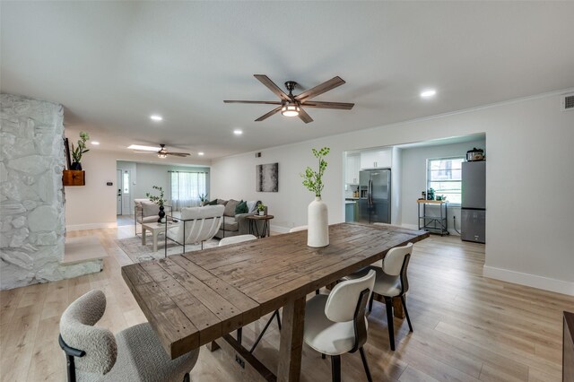 dining area with ceiling fan, recessed lighting, baseboards, and light wood finished floors