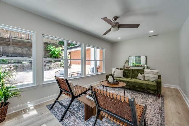 office with plenty of natural light, ceiling fan, light wood-type flooring, baseboards, and recessed lighting