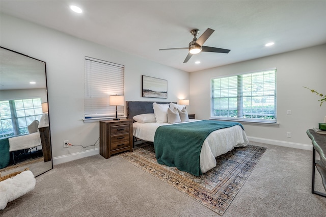 bedroom with baseboards, carpet, recessed lighting, and a ceiling fan