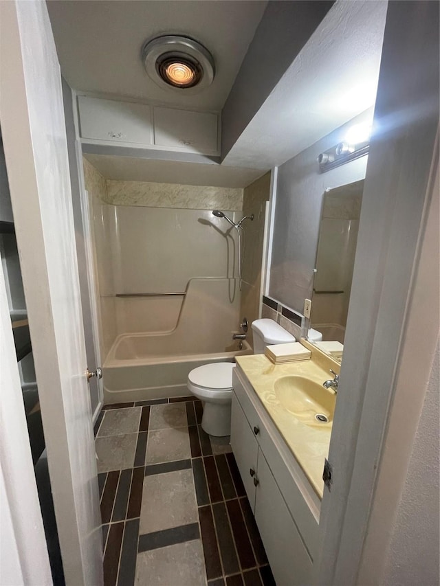 4514 Wyoming St, Dallas, TX 75211 - full bath featuring bathing tub / shower combination, vanity, and tile patterned flooring