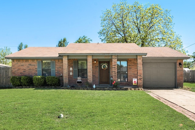 single story home featuring fence, a front lawn, concrete driveway, an attached garage, and brick siding