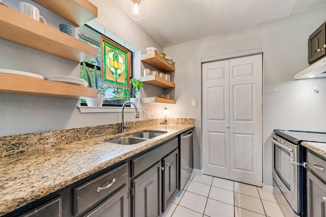 kitchen with a sink, appliances with stainless steel finishes, open shelves, under cabinet range hood, and light tile patterned floors