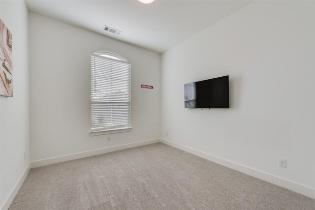 4600 Paintbrush Way, Aubrey, TX 76227 - spare room featuring carpet, visible vents, and baseboards