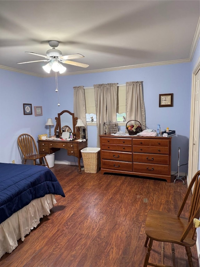 bedroom featuring dark wood-type flooring, a ceiling fan, and ornamental molding