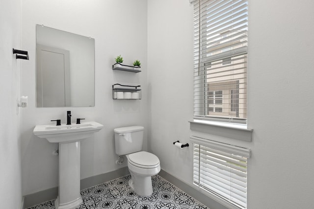2635 Carmelita St, Dallas, TX 75212 - bathroom with plenty of natural light and tile patterned floors