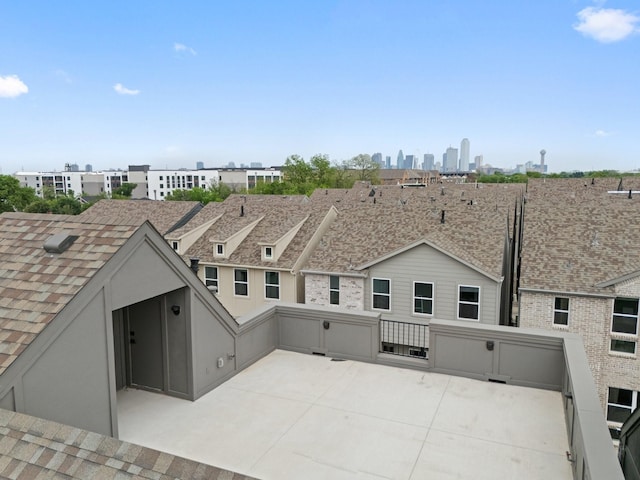 2635 Carmelita St, Dallas, TX 75212 - back of property featuring a patio and a shingled roof
