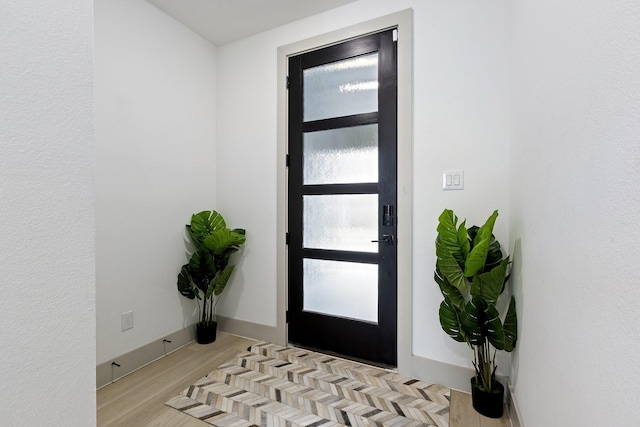 2635 Carmelita St, Dallas, TX 75212 - entrance foyer with light wood-style flooring