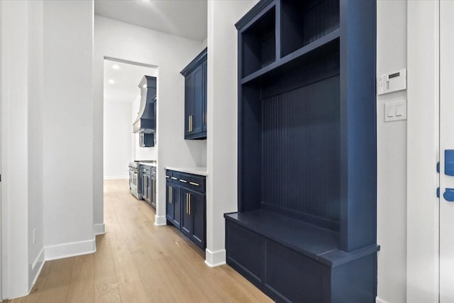 4120 Ridgecrest Dr, Flower Mound, TX 75022 - mudroom featuring baseboards and light wood-style floors