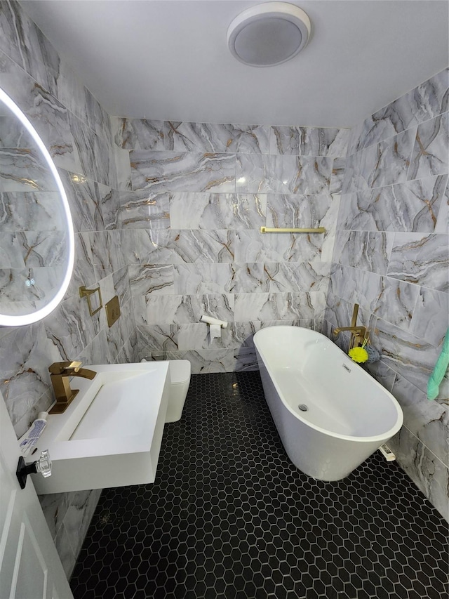 3123 Kellogg Ave, Dallas, TX 75216 - full bathroom featuring tile walls, a soaking tub, and a sink