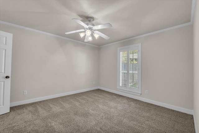 empty room with carpet, a ceiling fan, baseboards, and ornamental molding