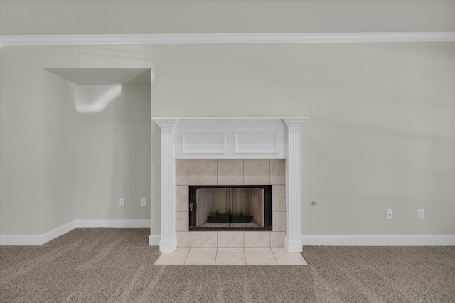 details featuring baseboards, carpet floors, ornamental molding, and a fireplace