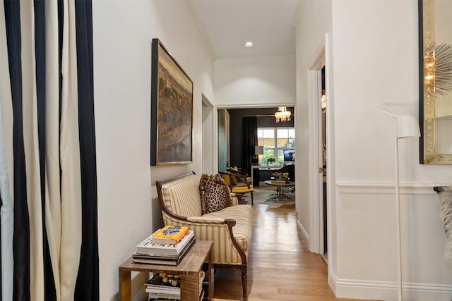 1747 Crescent Ln, Duncanville, TX 75137 - corridor featuring light wood-style flooring, recessed lighting, ornamental molding, and a chandelier