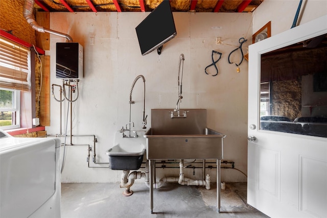 misc room featuring concrete floors and washer / clothes dryer