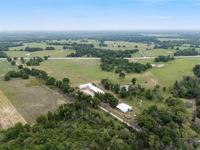 birds eye view of property featuring a rural view