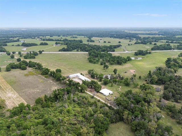 birds eye view of property featuring a rural view
