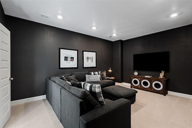 cinema featuring baseboards, visible vents, and carpet floors