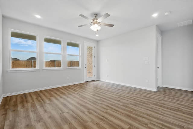 817 Hadley Dr, Princeton, TX 75071 - empty room featuring a ceiling fan, wood finished floors, and recessed lighting