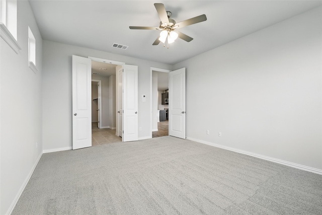 817 Hadley Dr, Princeton, TX 75071 - unfurnished bedroom with light colored carpet and a ceiling fan