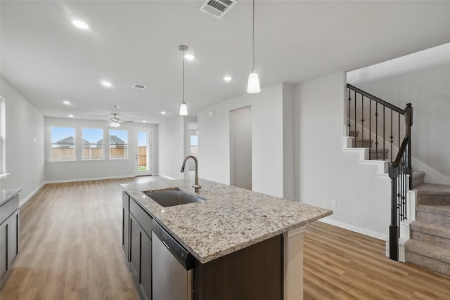 817 Hadley Dr, Princeton, TX 75071 - kitchen featuring stainless steel dishwasher, light wood-style flooring, a ceiling fan, decorative light fixtures, and recessed lighting