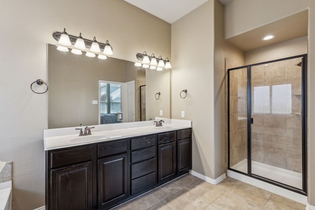 full bathroom with a shower stall, ensuite bathroom, and a sink