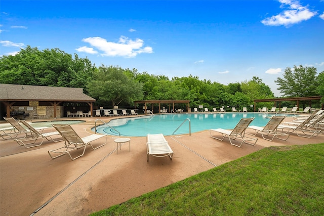 pool with a pergola and a patio