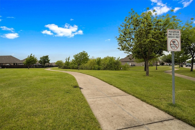 surrounding community with a lawn