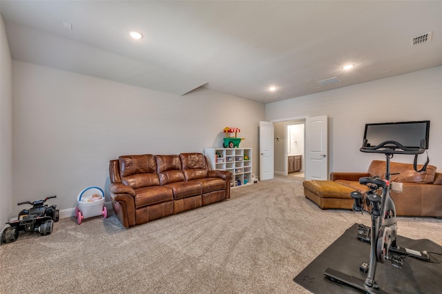 exercise area featuring recessed lighting, carpet floors, visible vents, and baseboards