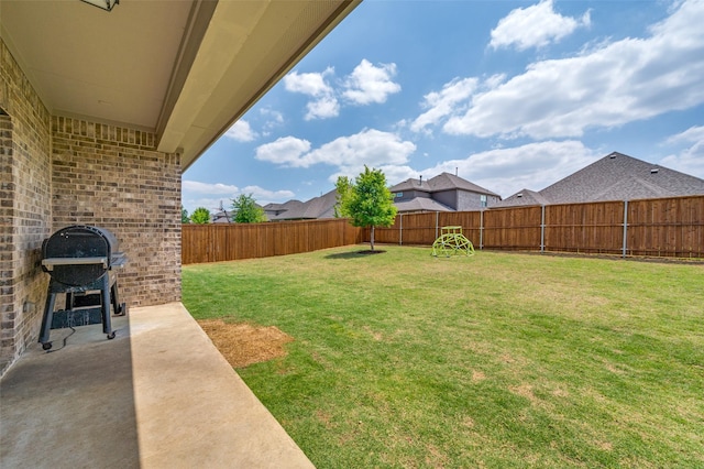 view of yard featuring a fenced backyard