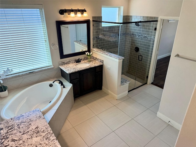 1005 Walford Dr, Forney, TX 75126 - full bath featuring a shower stall, a bath, vanity, and baseboards