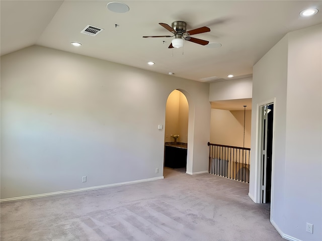 1005 Walford Dr, Forney, TX 75126 - unfurnished room with ceiling fan, light colored carpet, recessed lighting, baseboards, and arched walkways