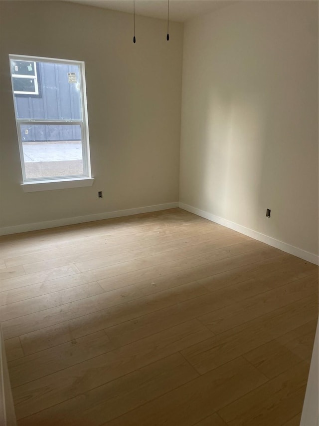 2510 Oxford Ave, Fort Worth, TX 76106 - empty room with baseboards and light wood-style flooring