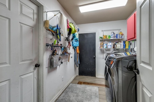 3031 Delaware Trl, Lake Worth, TX 76135 - washroom featuring separate washer and dryer and light wood-style floors