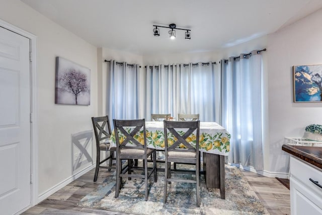 3031 Delaware Trl, Lake Worth, TX 76135 - dining room featuring light wood-style flooring and baseboards