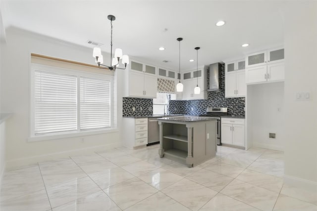 kitchen featuring stainless steel appliances, open shelves, visible vents, wall chimney exhaust hood, and a notable chandelier