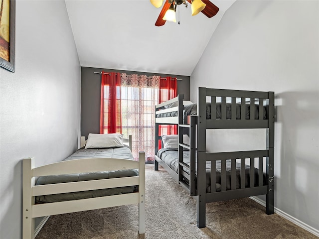 carpeted bedroom featuring vaulted ceiling and ceiling fan