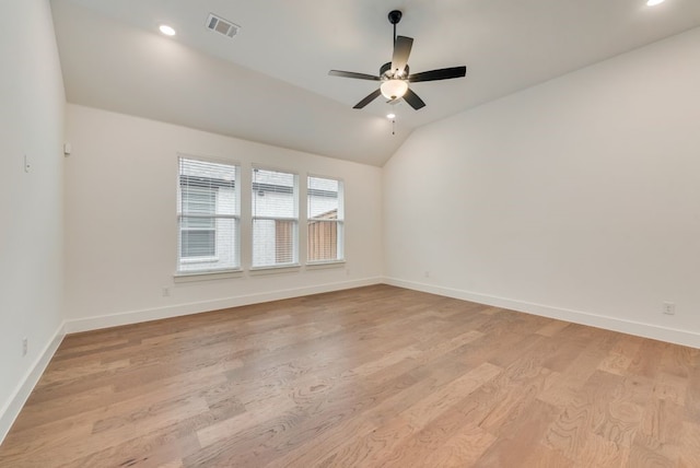 636 Caprice Blf, Fate, TX 75189 - empty room featuring lofted ceiling, visible vents, light wood-style floors, baseboards, and ceiling fan