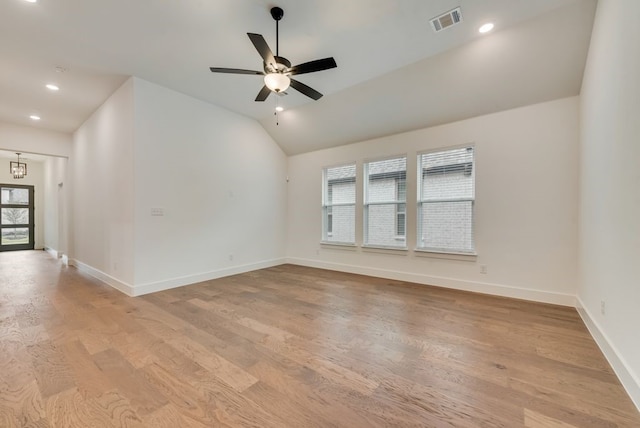 636 Caprice Blf, Fate, TX 75189 - empty room with light wood-type flooring, baseboards, visible vents, and lofted ceiling