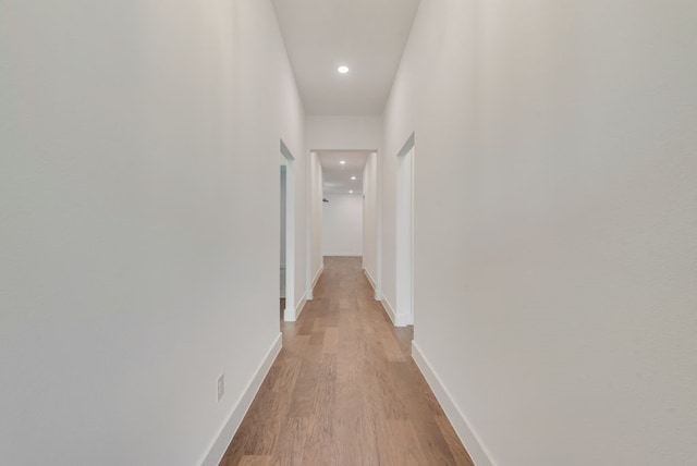 636 Caprice Blf, Fate, TX 75189 - hallway featuring recessed lighting, light wood-style flooring, and baseboards