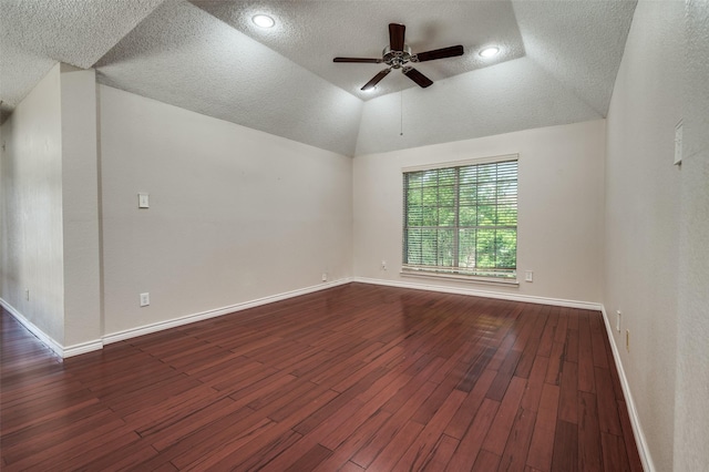 2704 Crestwood Ln, Highland Village, TX 75077 - unfurnished room with a ceiling fan, a textured ceiling, dark wood finished floors, baseboards, and vaulted ceiling
