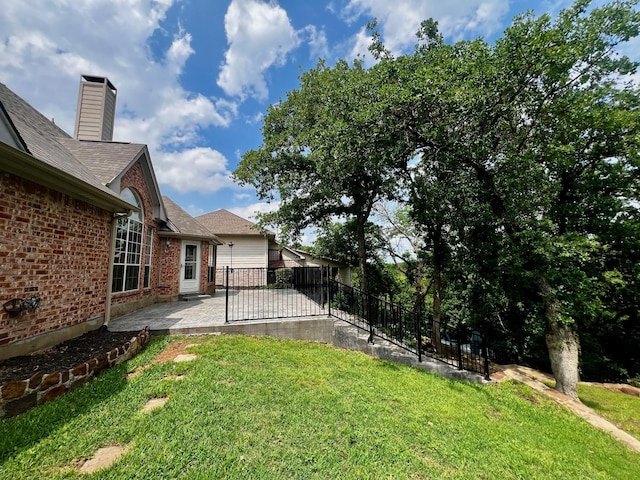 2704 Crestwood Ln, Highland Village, TX 75077 - view of yard featuring a patio