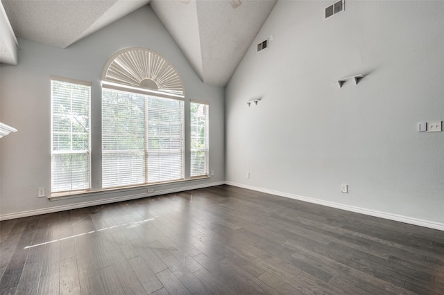 2704 Crestwood Ln, Highland Village, TX 75077 - spare room with dark wood finished floors, baseboards, and lofted ceiling