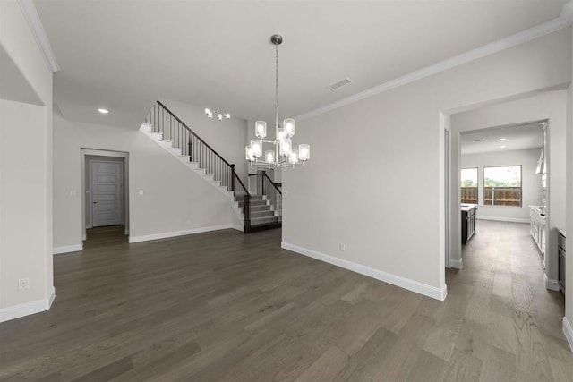 unfurnished dining area featuring dark wood-type flooring, baseboards, visible vents, and stairs