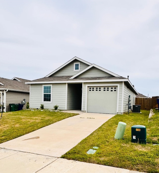 2311 Alcantara Ave, Crandall, TX 75114 - ranch-style house featuring fence, a front lawn, central AC, and concrete driveway