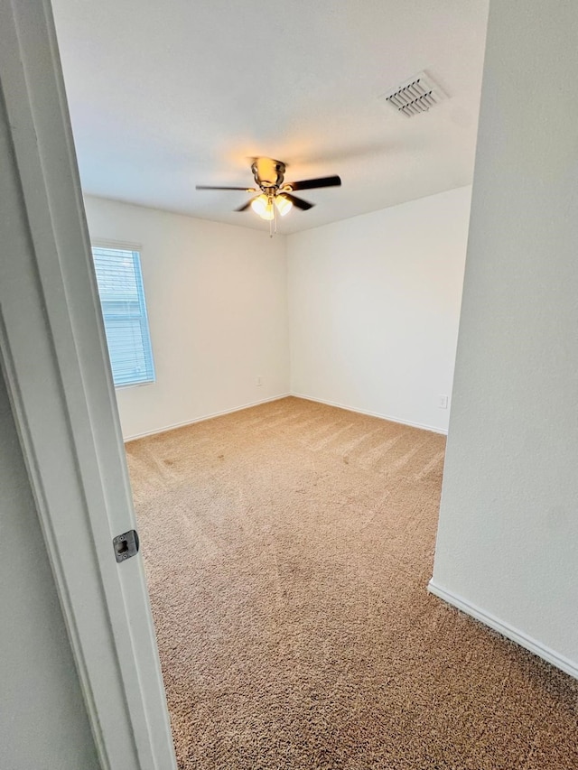 2311 Alcantara Ave, Crandall, TX 75114 - unfurnished room featuring ceiling fan, visible vents, and carpet flooring