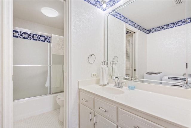4924 Cobbs Dr Unit 3D, Waco, TX 76710 - bathroom with enclosed tub / shower combo, toilet, vanity, and tile patterned floors