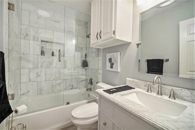 5625 Guadalajara Dr, North Richland Hills, TX 76180 - bathroom with toilet, combined bath / shower with glass door, and vanity