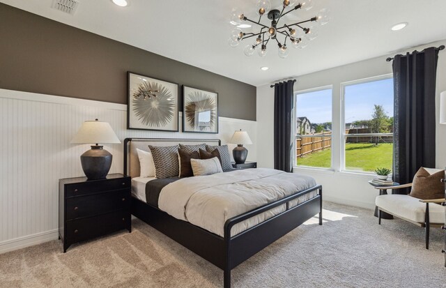 5939 Mayer Ave, Pilot Point, TX 75009 - bedroom featuring baseboards, visible vents, carpet floors, and a notable chandelier