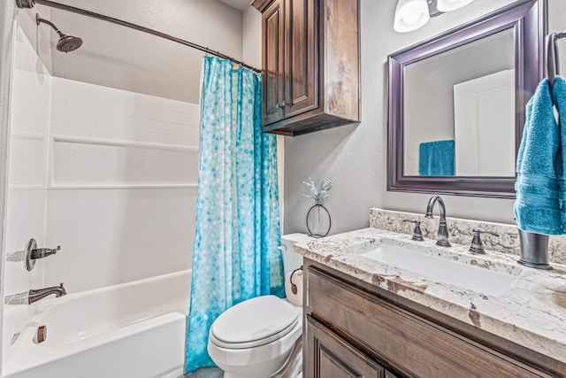 5003 Frio Dr, Granbury, TX 76048 - bathroom featuring vanity, shower / tub combo, toilet, and a textured wall
