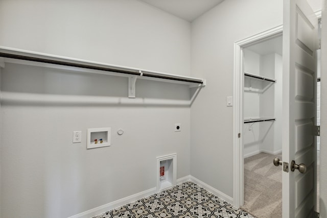 washroom featuring hookup for a washing machine, electric dryer hookup, baseboards, gas dryer hookup, and laundry area